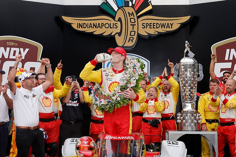 Newgarden celebrating back to back Indy 500 win