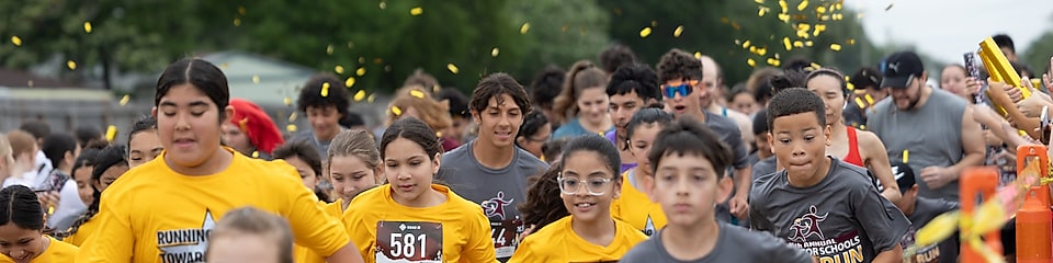 Group of students running in the fun run 