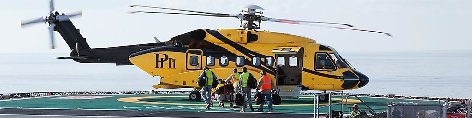 Helicopter taking off during cargo load