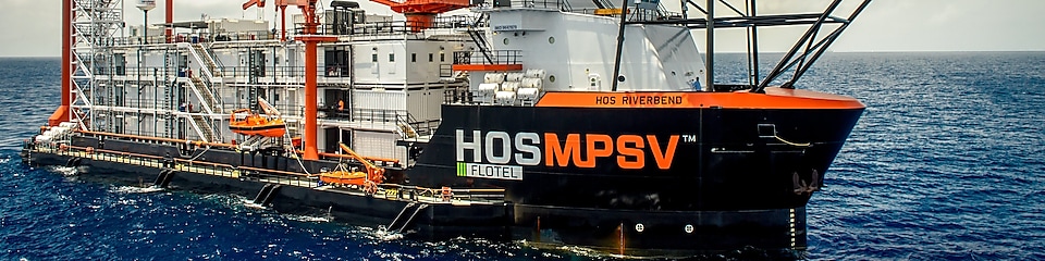 close-up side view of flotel vessel