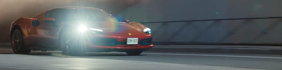 A red car in a tunnel