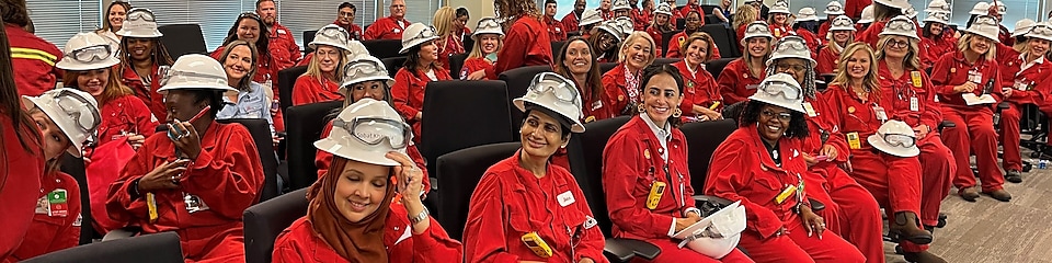 Room of Women Business Owners wearing Shell red PPE
